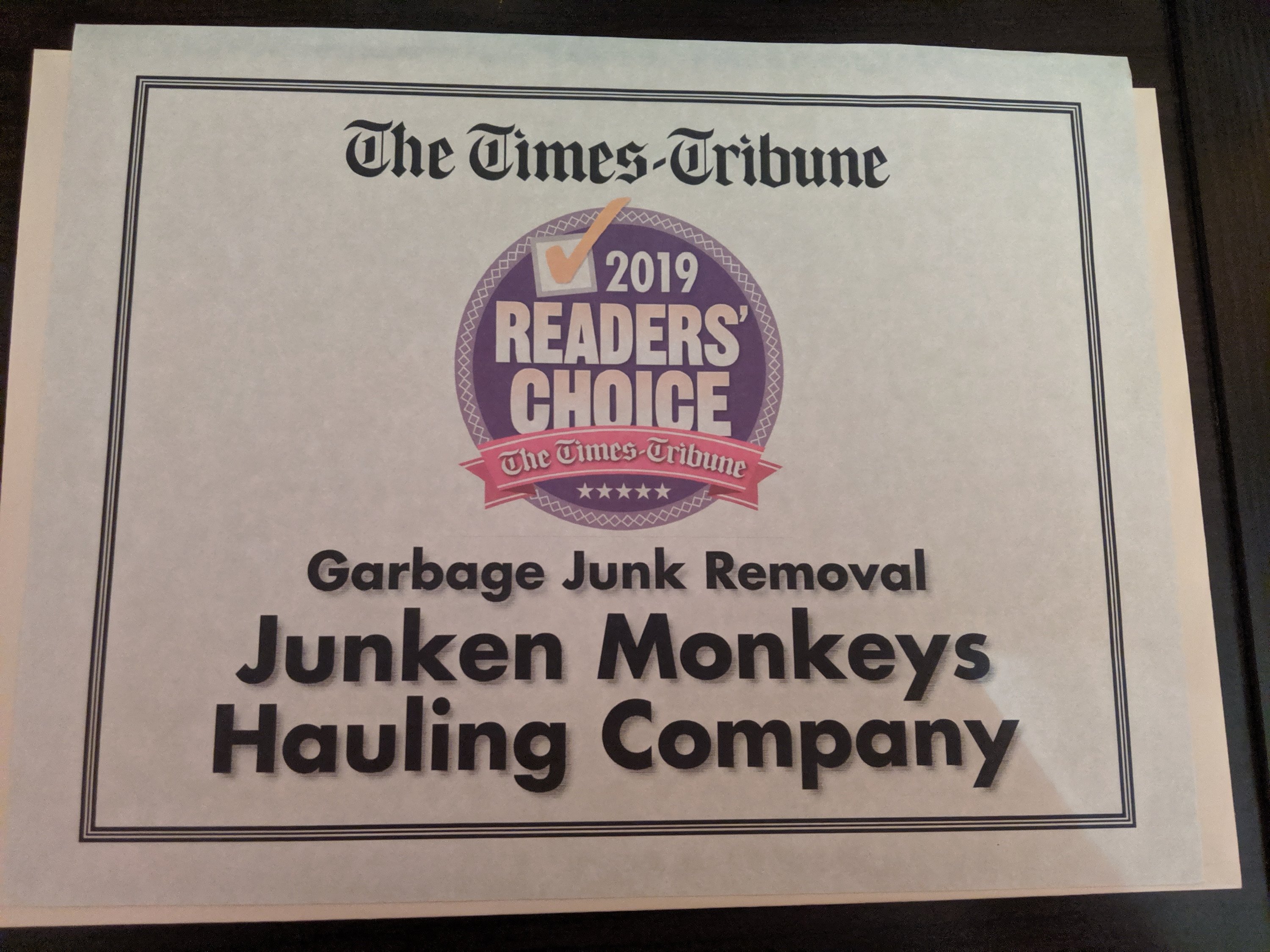 Certificate titled "Readers' Choice 2019" awarded to Junken Monkeys Hauling Company for garbage junk removal by The Times-Tribune.